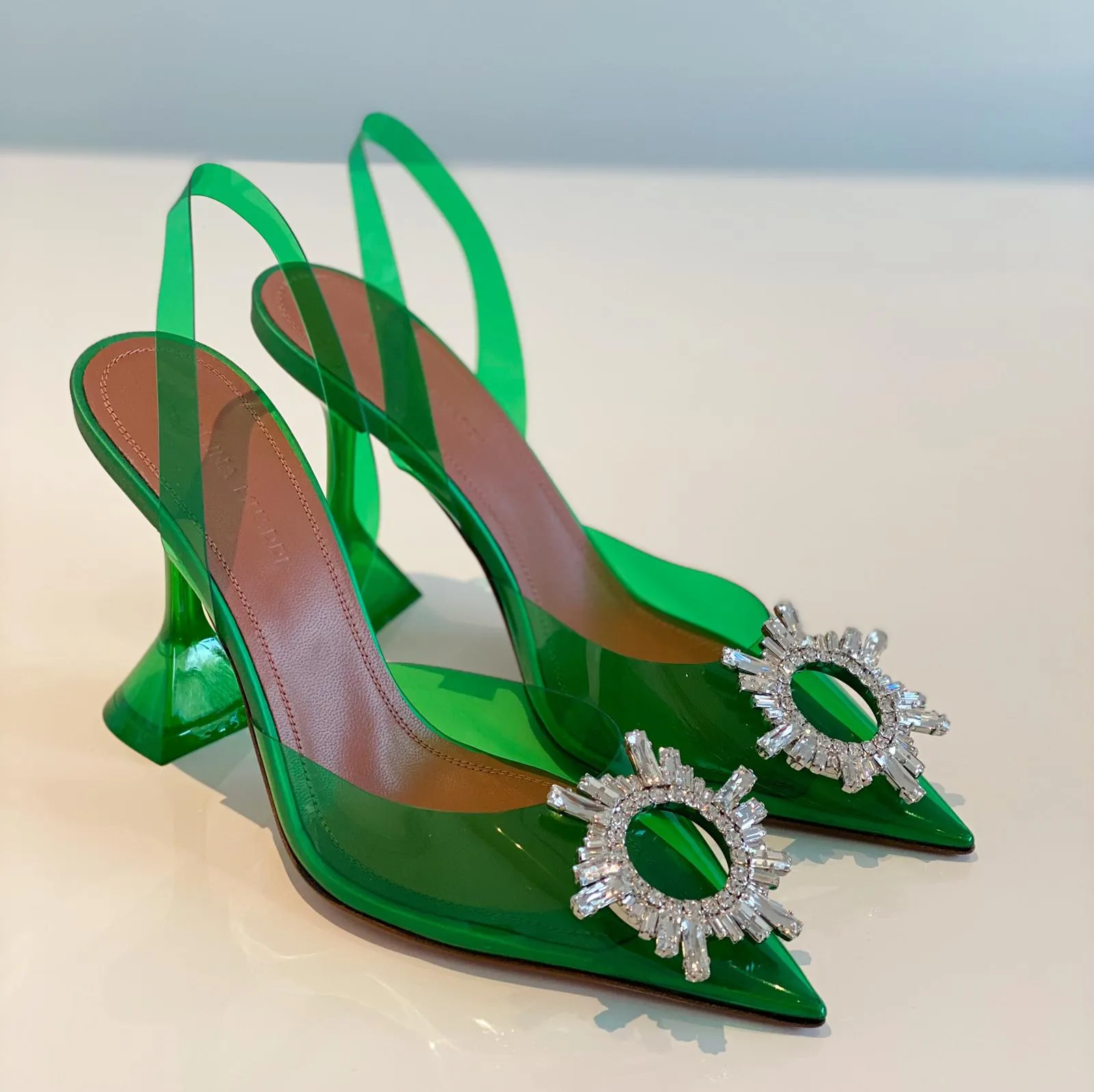 Amina Muaddi Begum Crystal Green PVC Slingback Pumps